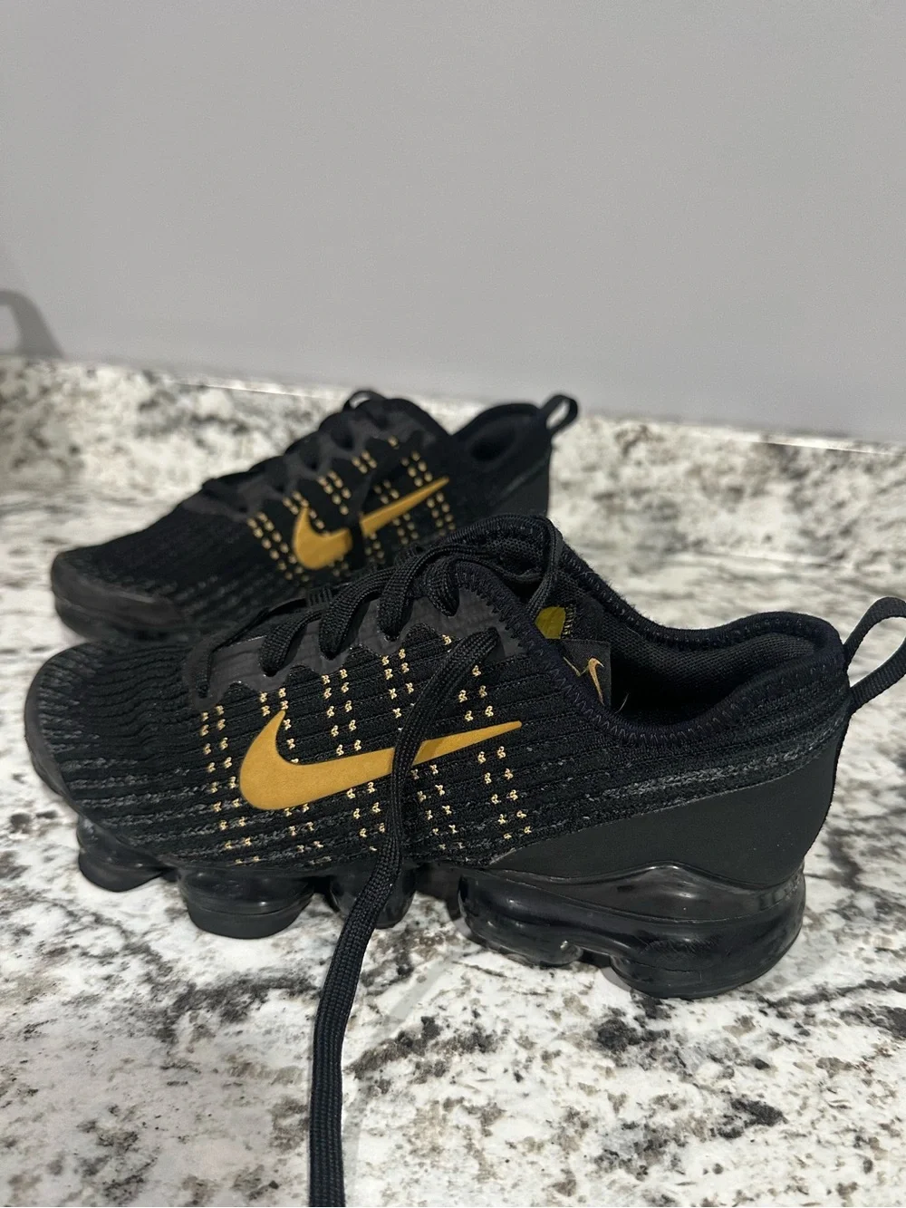 Nike Kids Black and Gold Swoosh Knit Sneakers